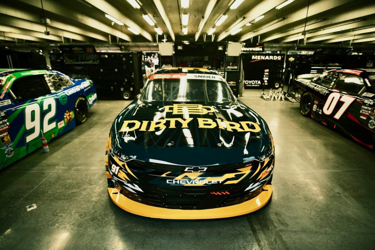 Front view of the Dirty Bird No. 91 Chevrolet in the garage at Charlotte Motor Speedway.